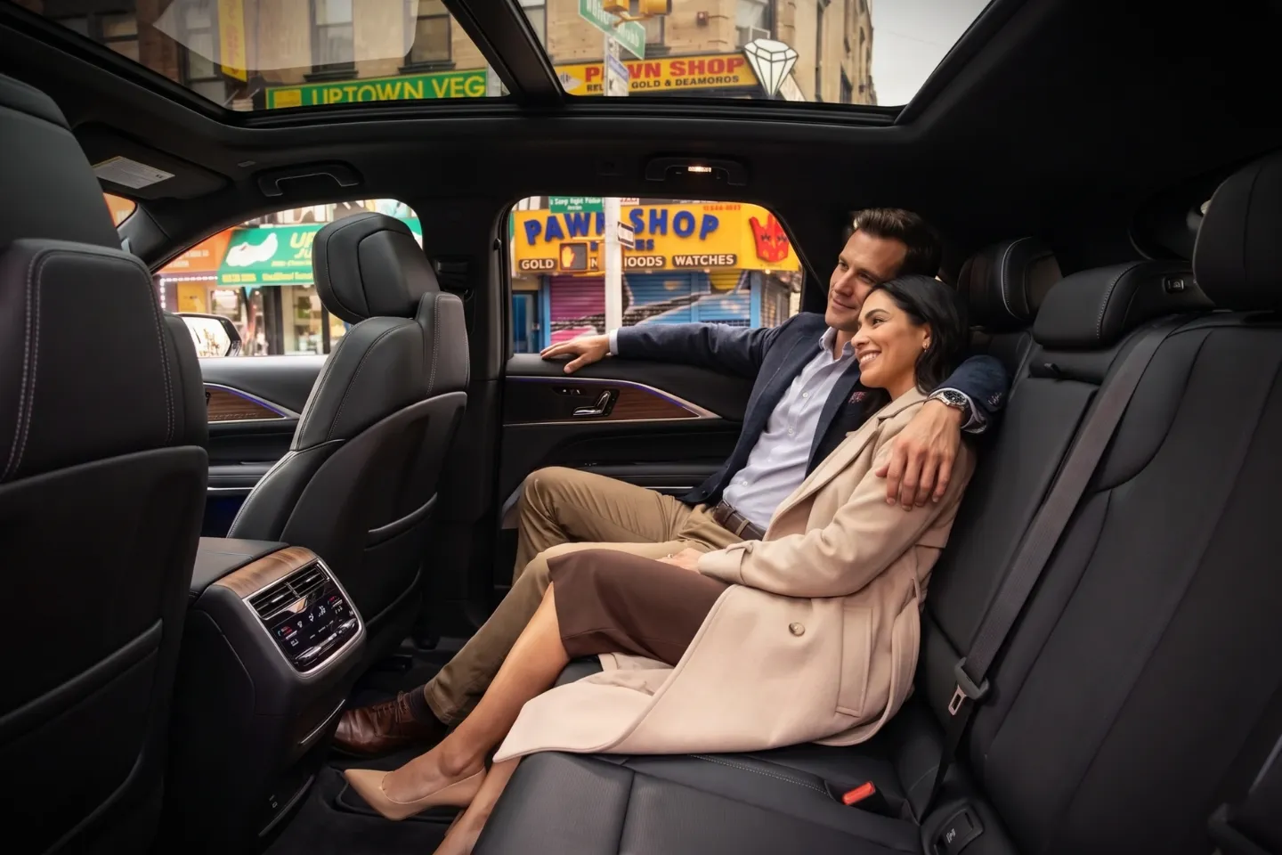 Professional chauffeur greeting a business traveler in East Harlem, NY
