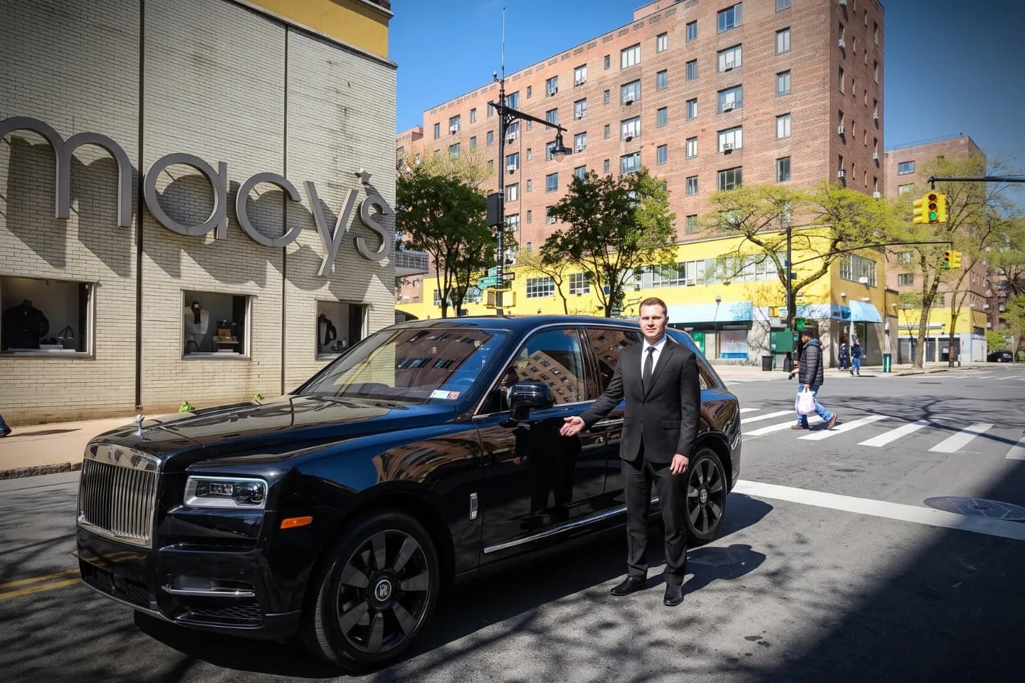 Weekend chauffeur service sedan parked on a quiet Parkchester, Bronx block