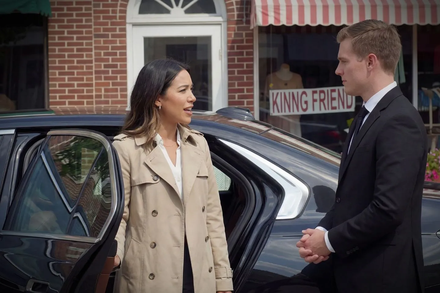 Chauffeur Service in New Jersey, NJ Chauffeur opening car door for client using New Jersey, NJ Chauffeur Service in downtown setting