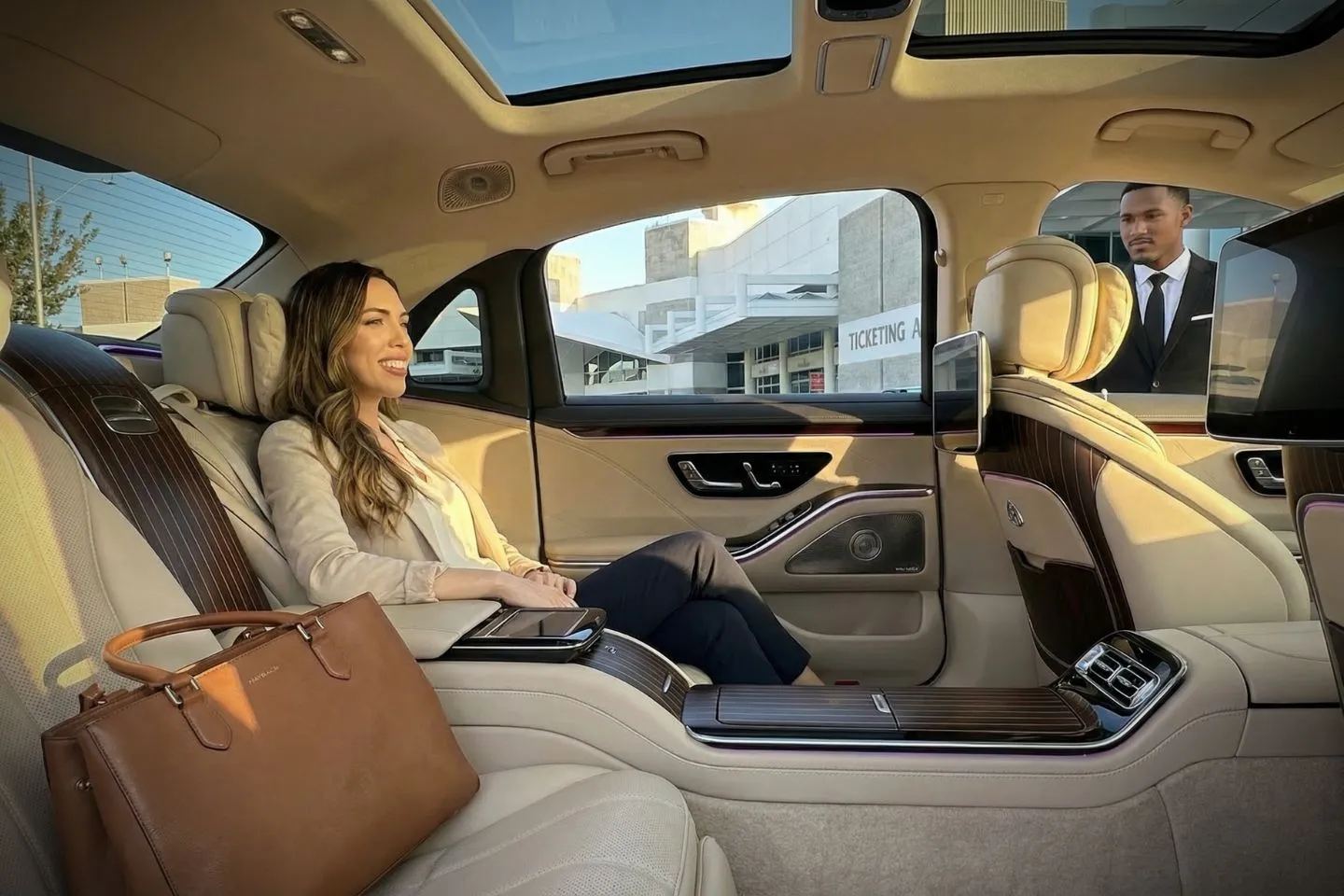 Airport Car Service in Florida, FL Black SUV offering Florida, FL Car Service parked outside upscale hotel