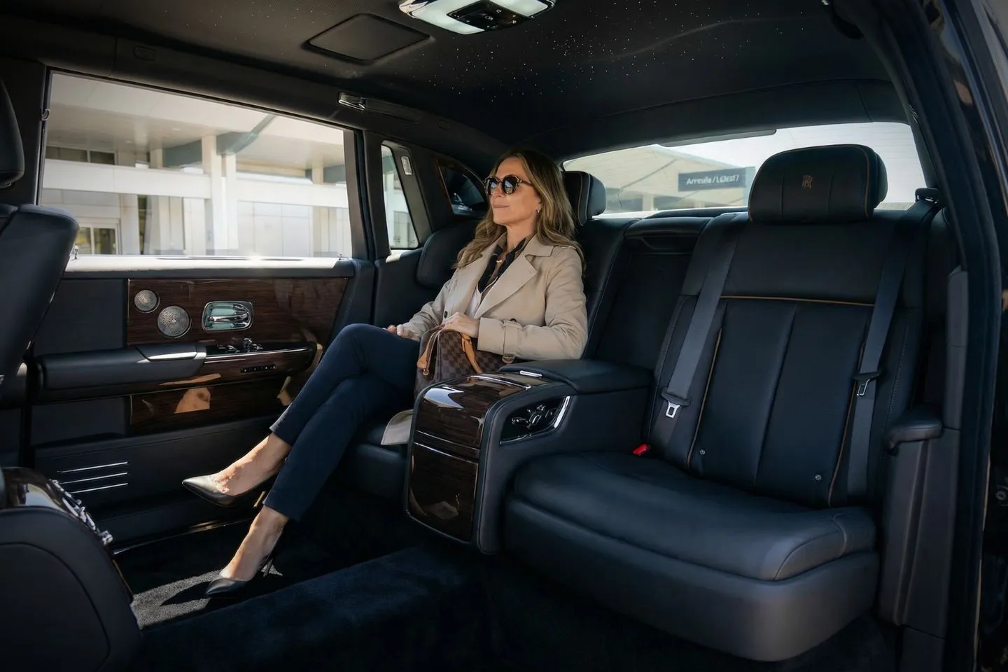 Airport Car Service in Mississippi, MS Mississippi MS Car Service black SUV on highway with city skyline travel