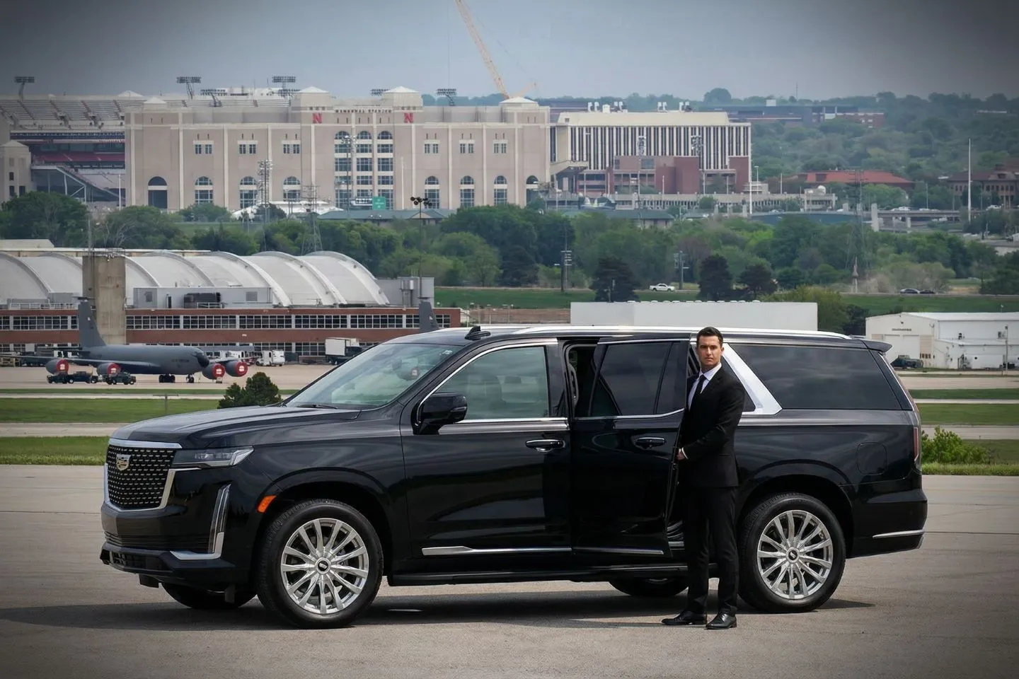 Airport Car Service in Nebraska, NE Airport transfer vehicle representing Nebraska, NE Car Service arriving at terminal with luggage assistance