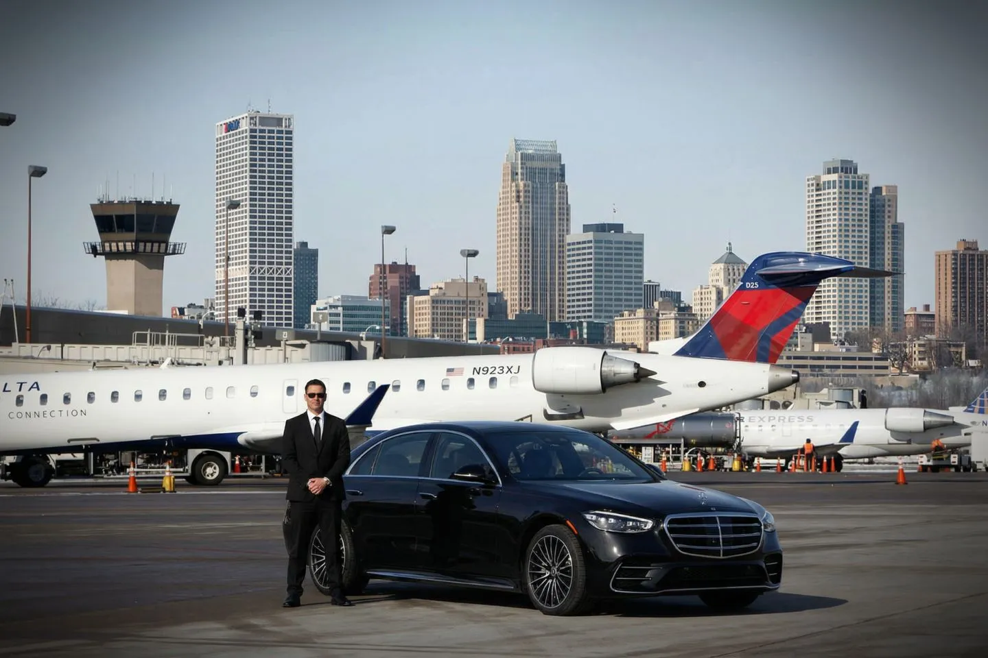 Airport Car Service in Wisconsin, WI Corporate client riding in executive vehicle from Wisconsin, WI Car Service during business commute