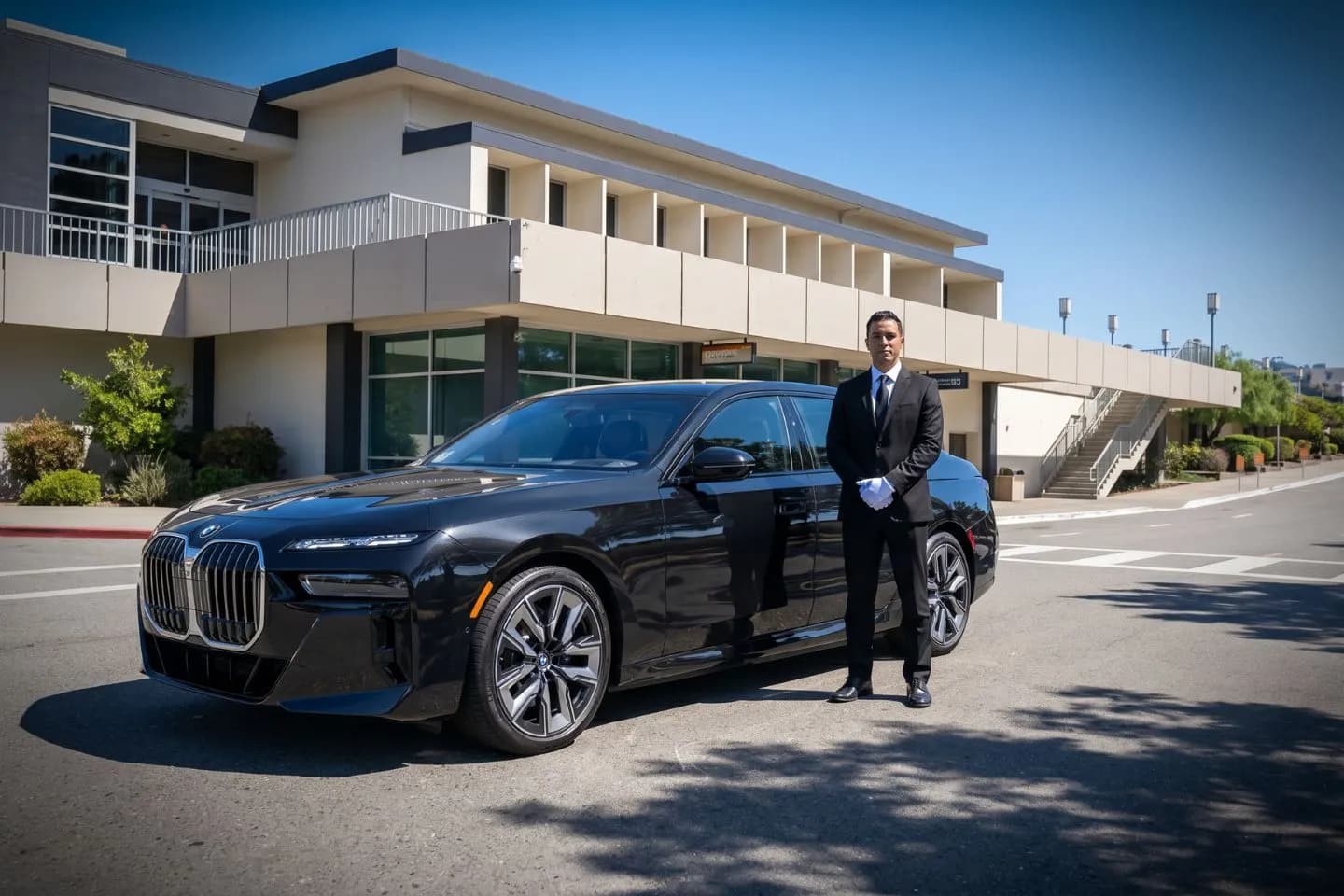 Monterey Regional (MRY) Airport Car Service Black BMW 7 Series chauffeured car at Monterey airport for ride to the AT&T Pebble Beach Pro Am