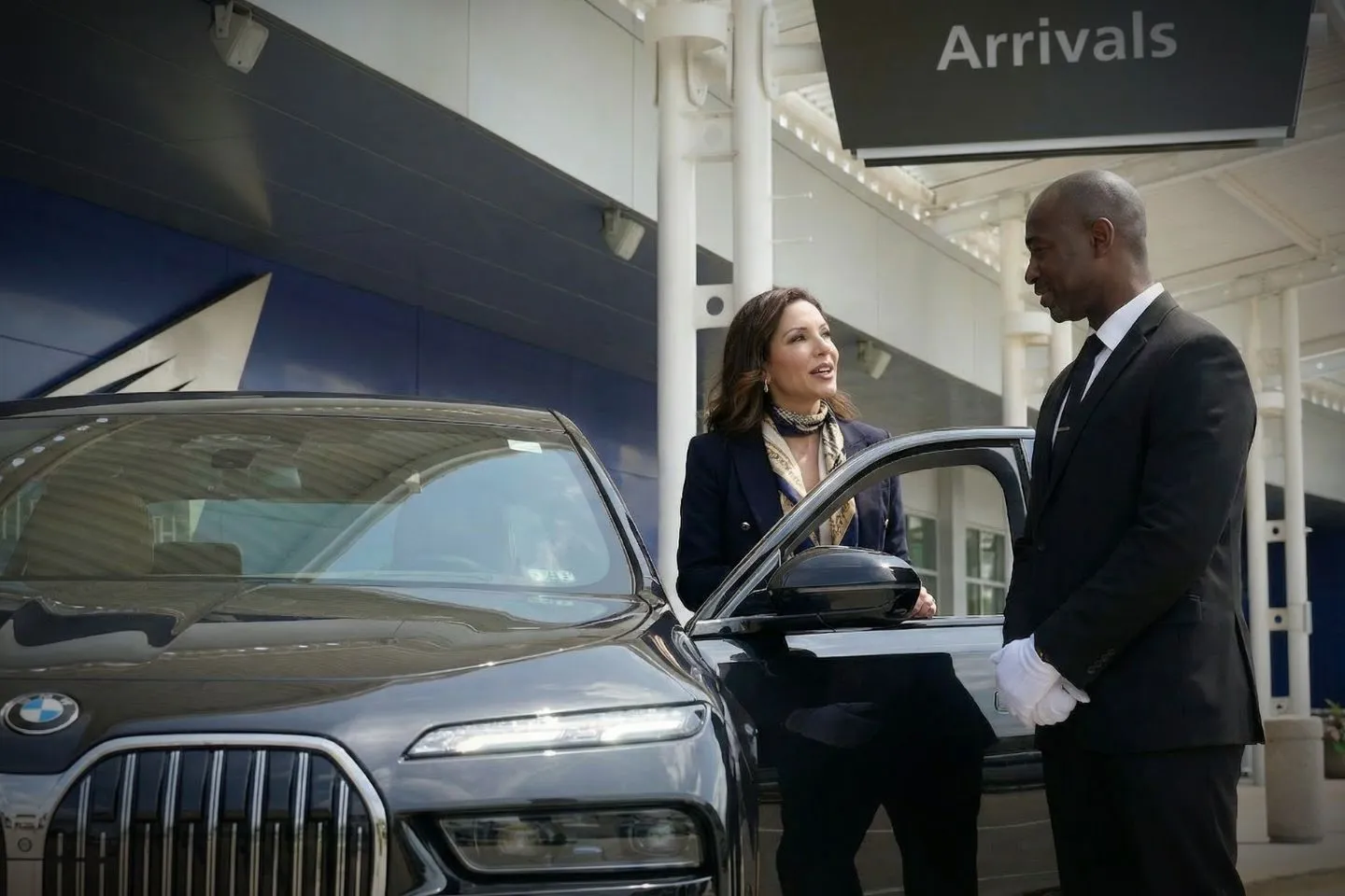 Birmingham Shuttlesworth International (BHM) Airport Car Service Union Limousine chauffeur greeting executive at BHM Birmingham Shuttlesworth airport baggage claim