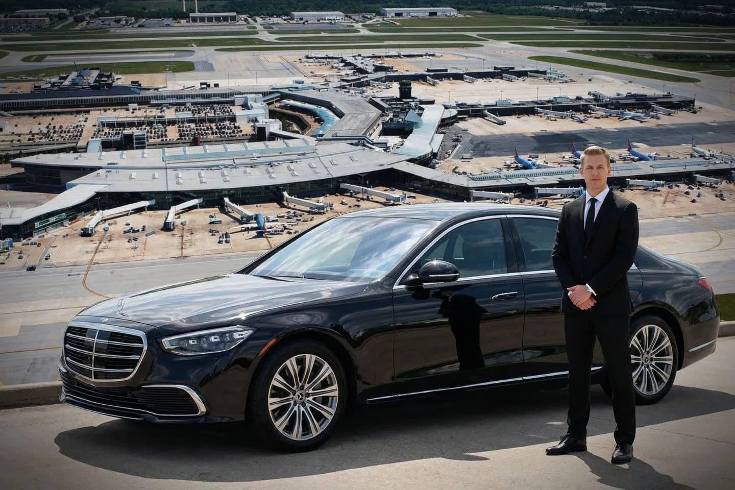 Baltimore International Thurgood Marshall (BWI) Airport Car Service Black Cadillac Escalade chauffeured car at BWI airport for Preakness Stakes ride to Pimlico Race Course