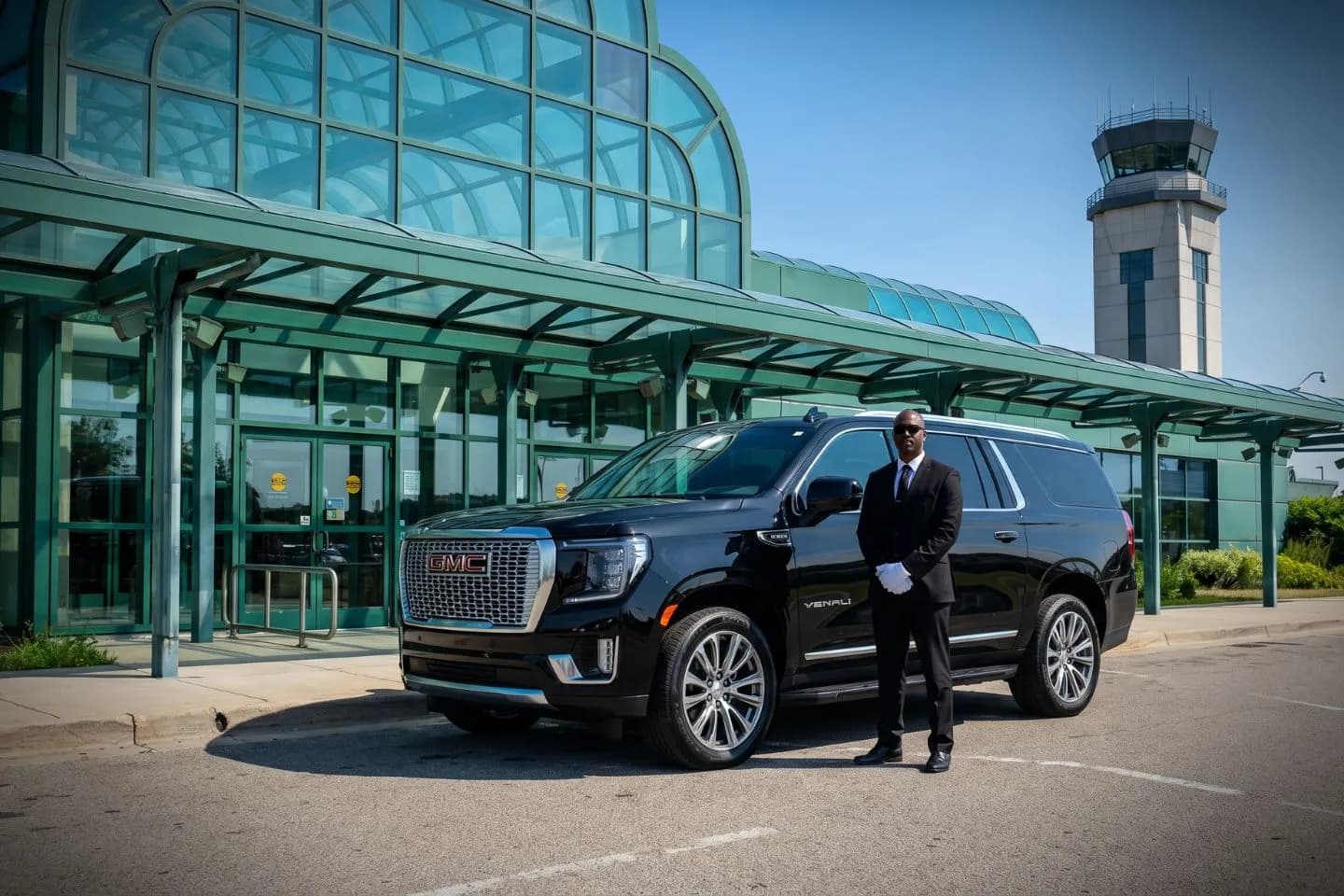 Muskegon County (MKG) Airport Car Service ack Cadillac Escalade chauffeured car at Muskegon County airport for ride to USS Silversides submarine museum