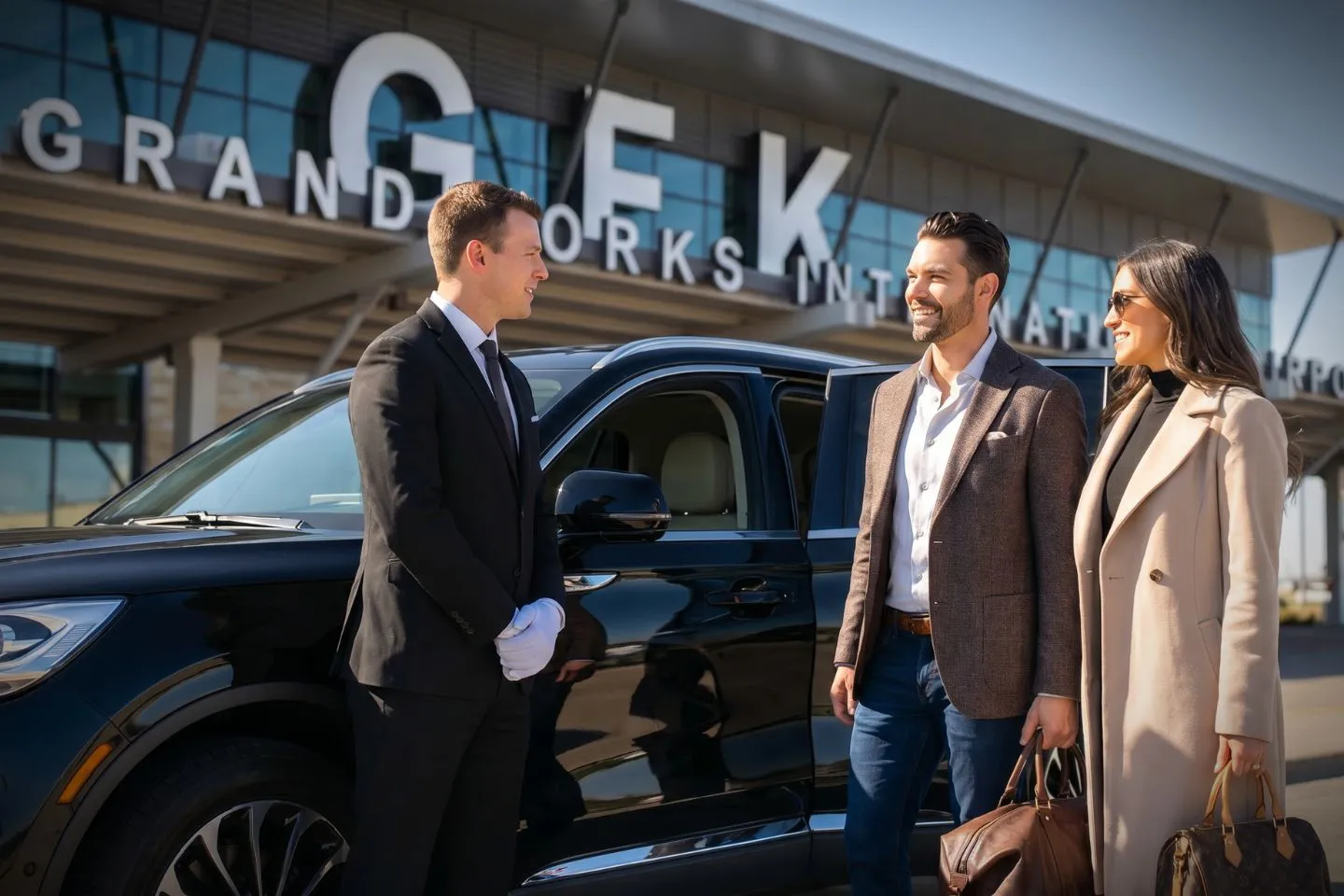 Grand Forks International (GFK) Airport Car Service Premium Cadillac Escalade providing Grand Forks GFK airport car service to University of North Dakota campus and Alerus Center