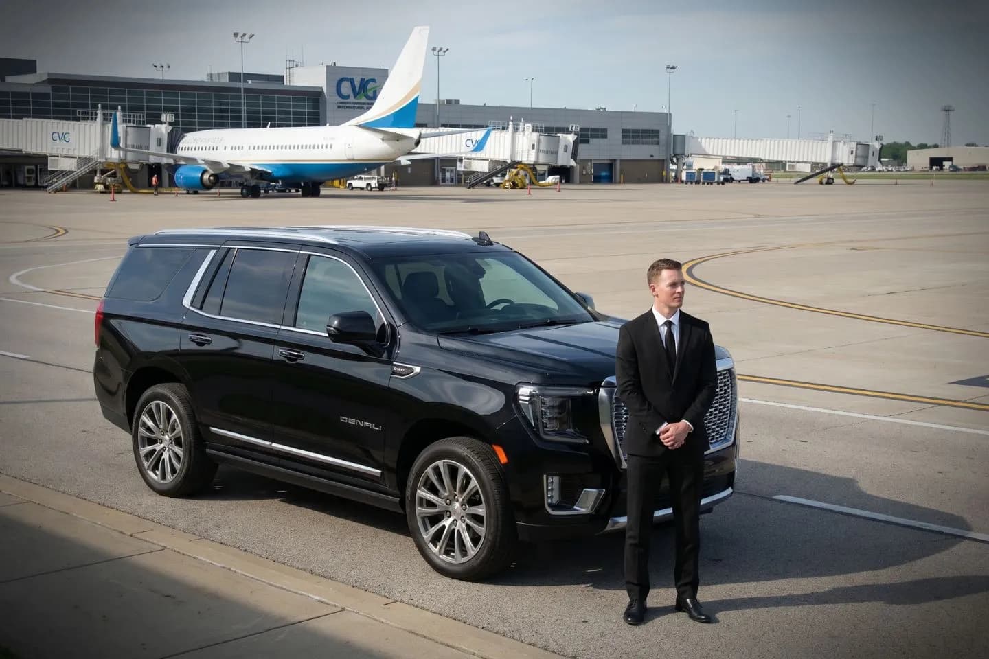 Akron Canton (CAK) Airport Car Service Black luxury sedan parked at Akron Canton Airport terminal curbside in Ohio