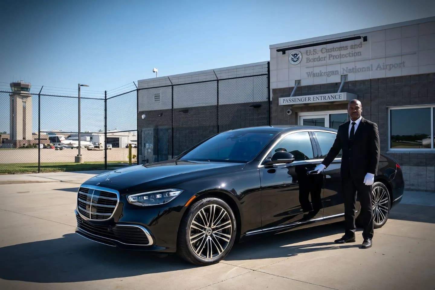 Waukegan National (UGN) Airport Car Service Luxury black Mercedes Benz S Class at Waukegan National Airport UGN terminal curbside in Illinois