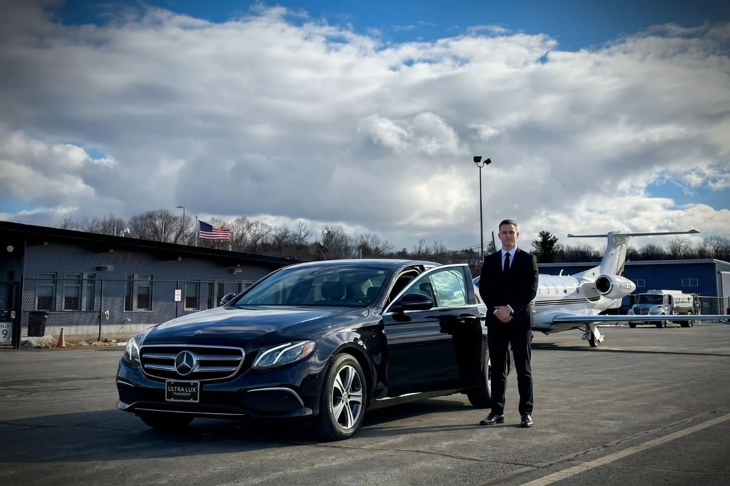 Fitchburg Municipal (FIT) Airport Car Service Black Cadillac Escalade chauffeured car at Fitchburg Municipal airport for ride to UMass Memorial HealthAlliance and north central Massachusetts