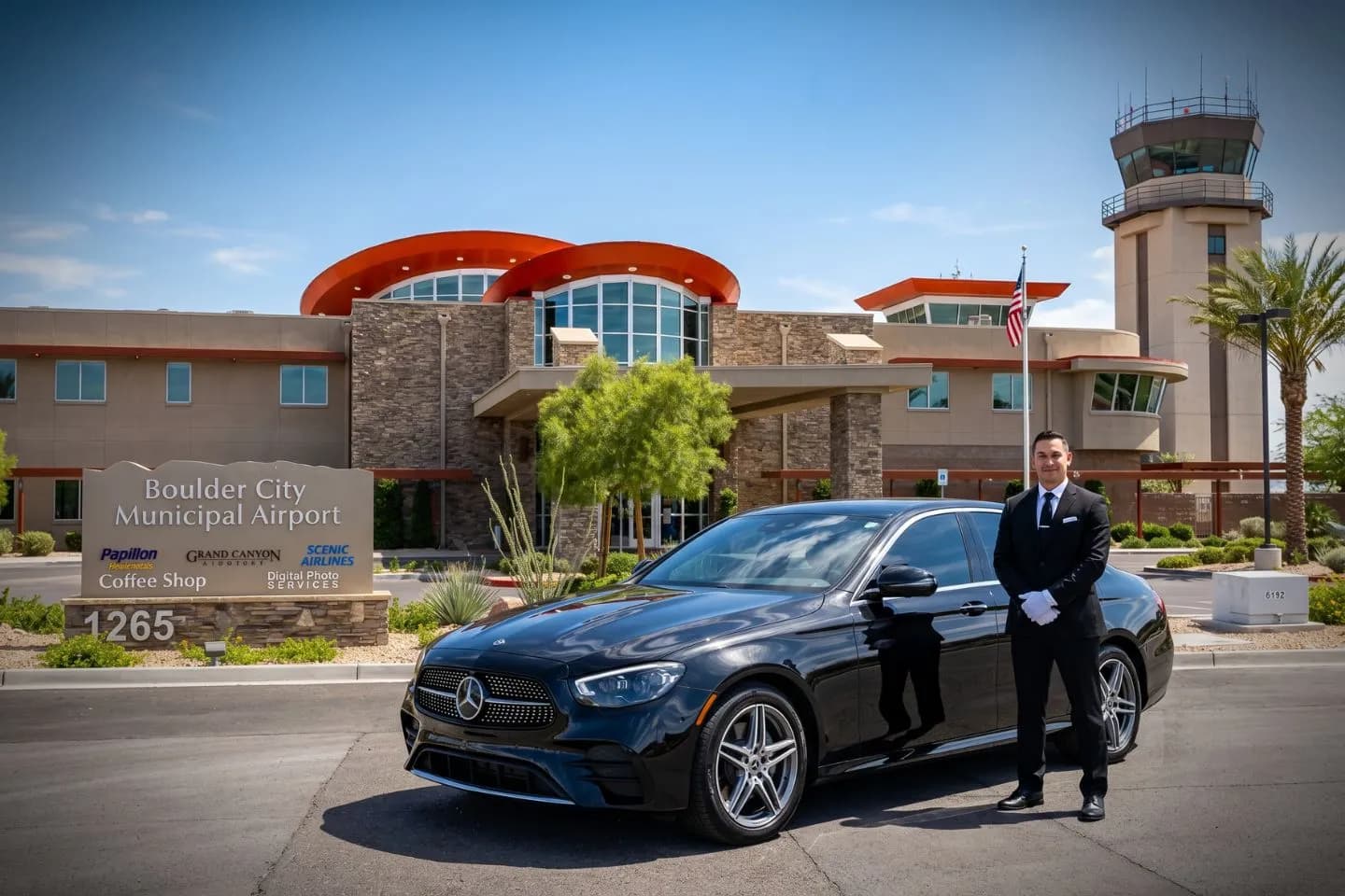 Boulder City Municipal (BLD) Airport Car Service Luxury black Mercedes Benz S Class at Boulder City Municipal Airport BLD terminal curbside in Nevada