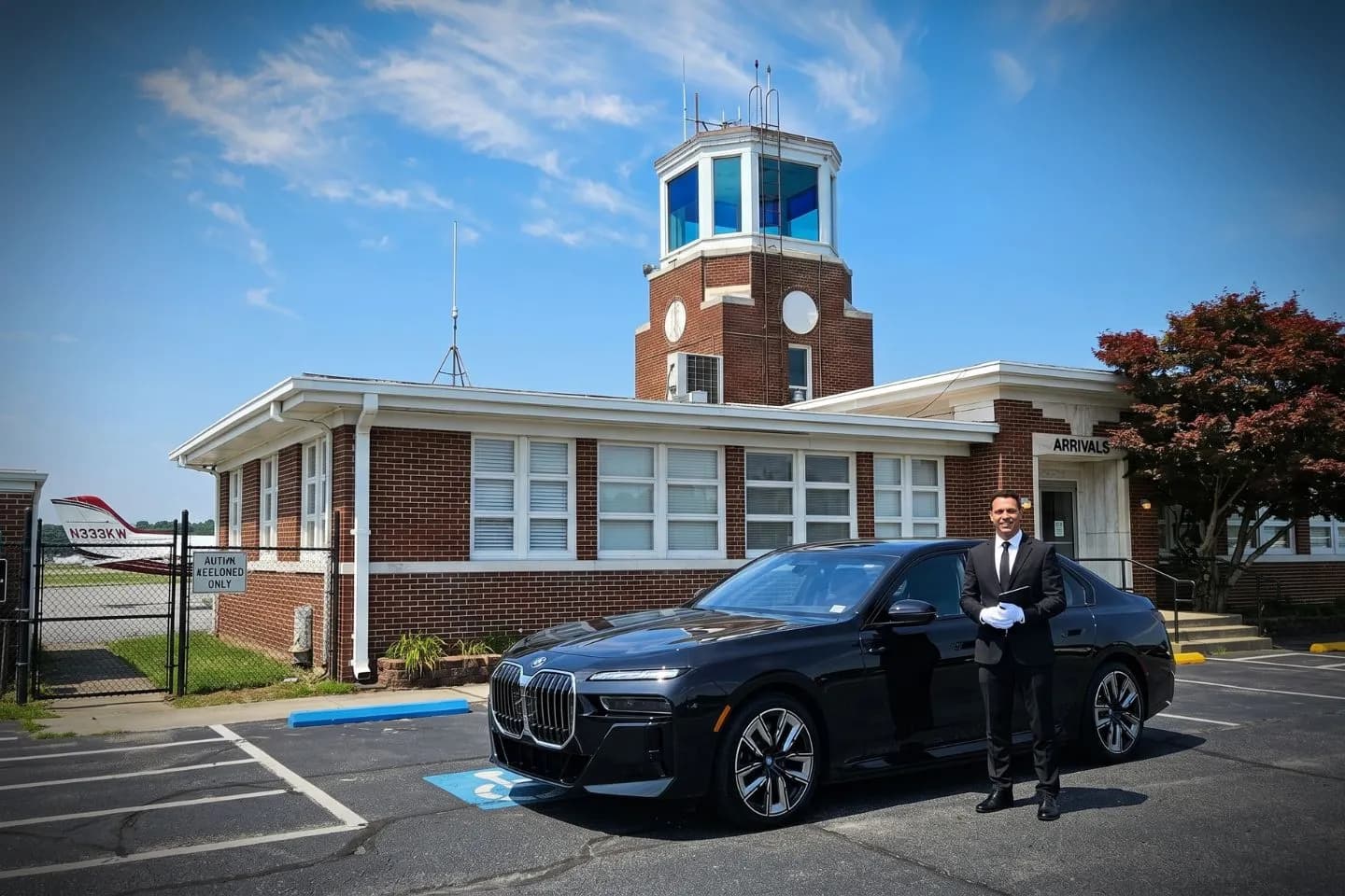 Gainesville Lee Gilmer Memorial (GVL) Airport Car Service Union Limousine chauffeur greeting Lake Lanier guest at GVL Gainesville Lee Gilmer Memorial airport FBO