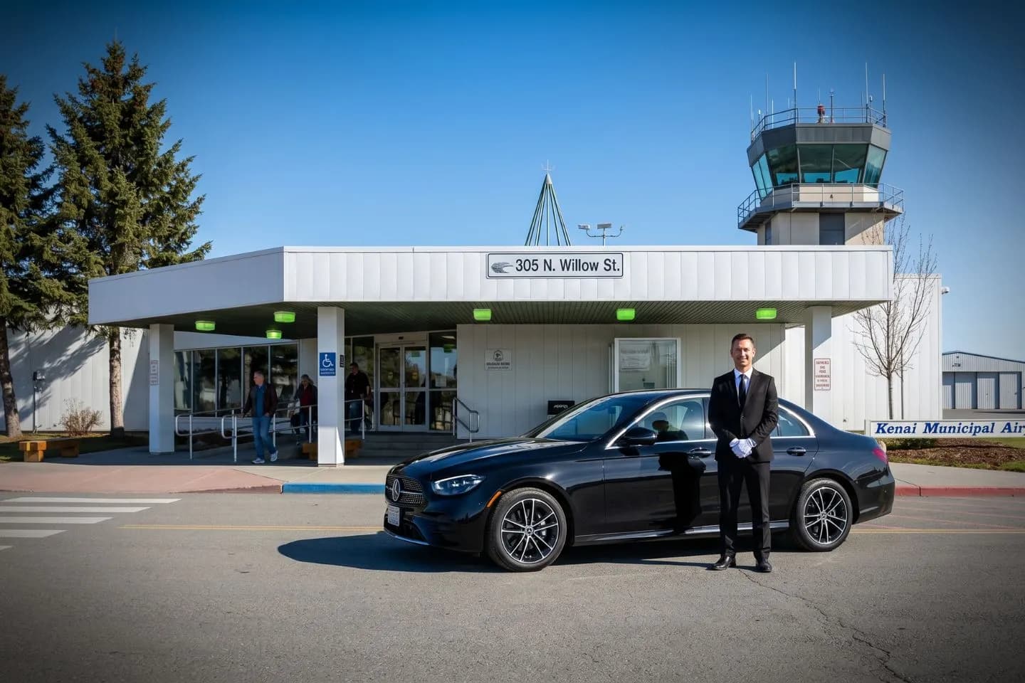 Kenai Municipal (ENA) Airport Car Service Luxury black Mercedes Benz S Class at Kenai Municipal Airport ENA terminal curbside in Alaska