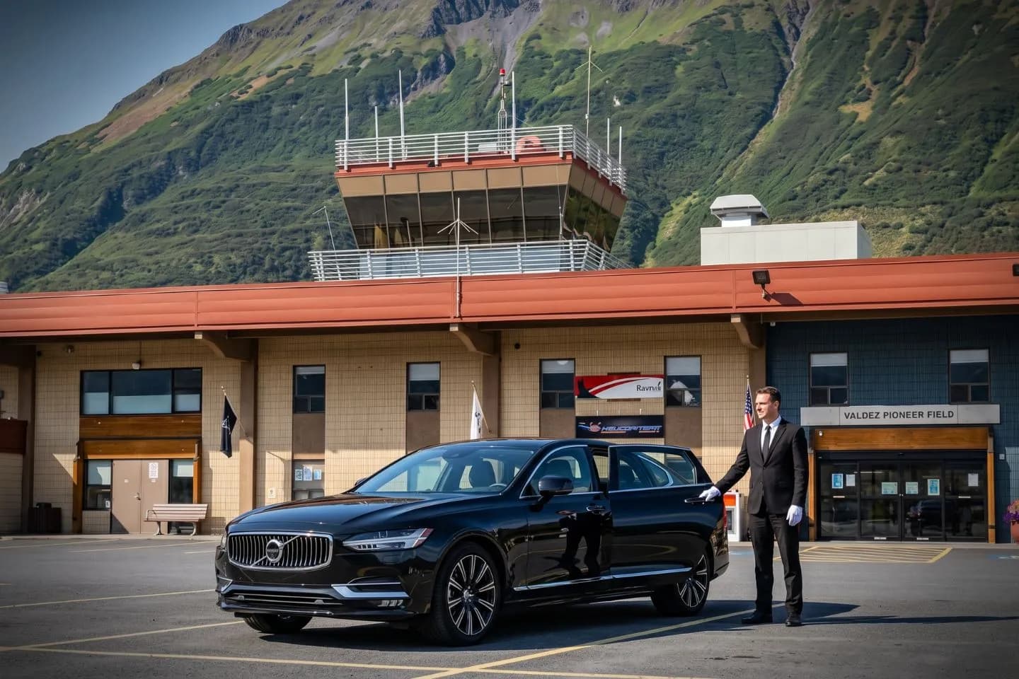 Valdez (VDZ) Airport Car Service Union Limousine chauffeur greeting Trans Alaska Pipeline System guest at VDZ Valdez Pioneer Field airport baggage claim
