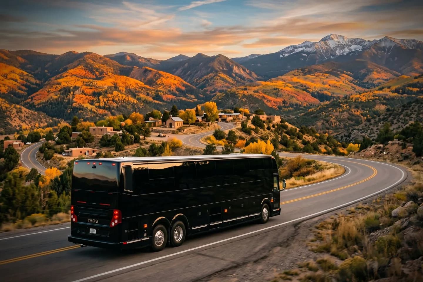 New Mexico Charter Bus Rental Service White charter bus parked outside an Albuquerque hotel awaiting a New Mexico tour group