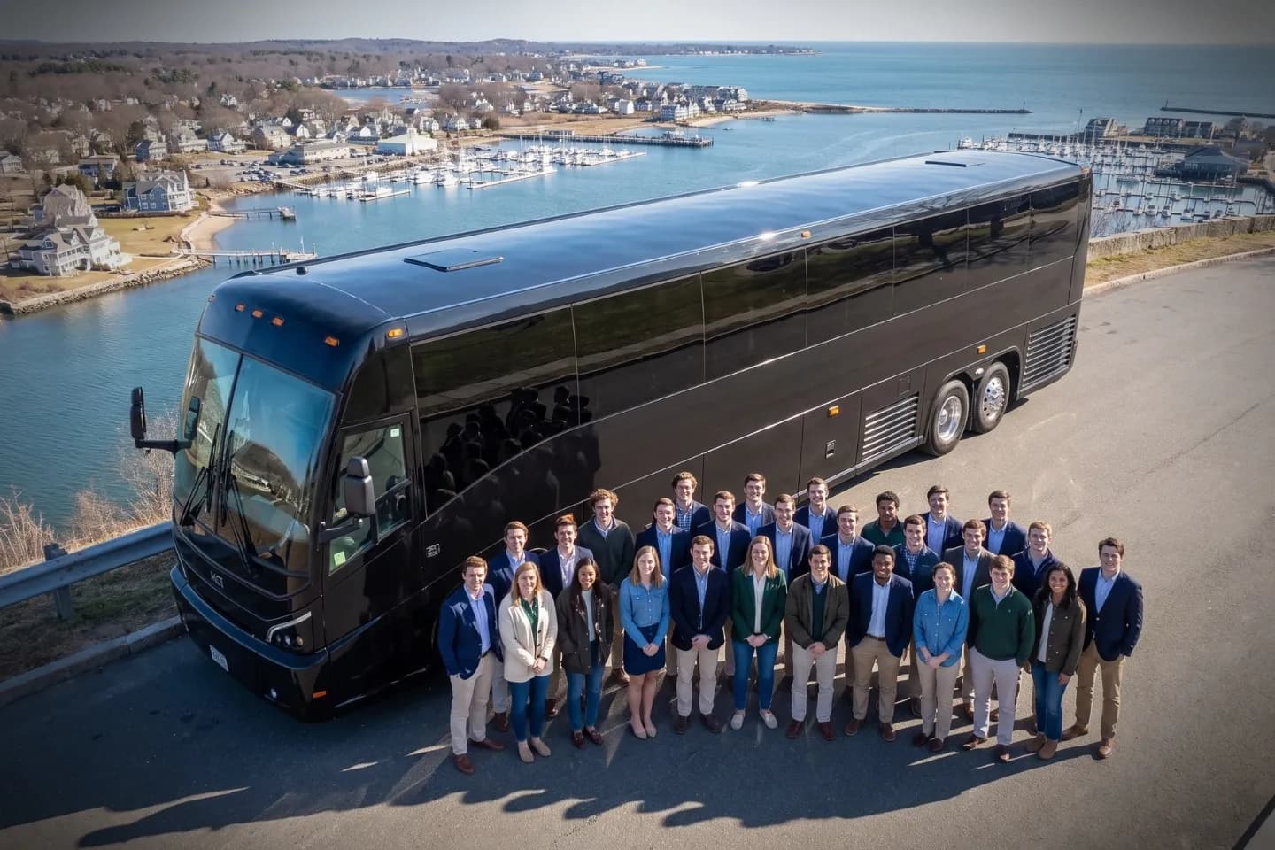 Connecticut Charter Bus Rental Service Professional driver welcoming guests aboard a luxury charter bus in Connecticut