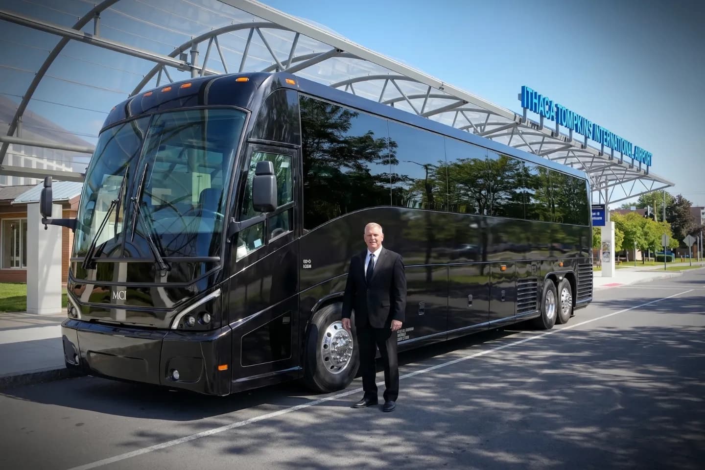 Ithaca Tompkins International (ITH) Airport Charter Bus Rental Service Comfortable seating inside a charter bus ready for ITH Airport passengers
