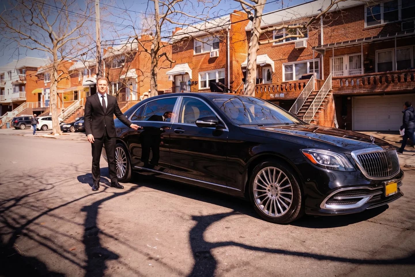 Car Service in Georgetown, Brooklyn, NY Front view of a black car available for Georgetown, Brooklyn car service