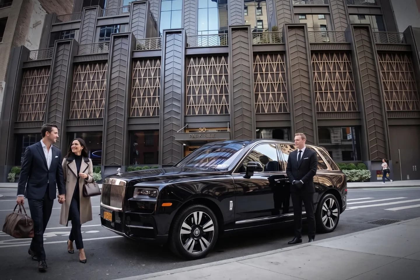 Car Service in Rose Hill, Manhattan, NY Chauffeur greeting a passenger outside a Rose Hill NYC apartment building