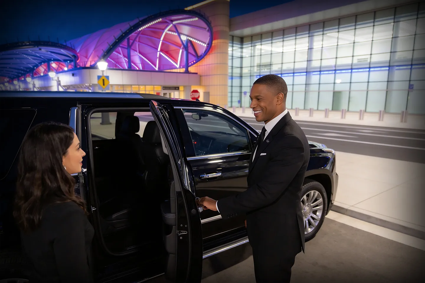 Luxury black car service for pickup and drop-off at Rochester International Airport, NY