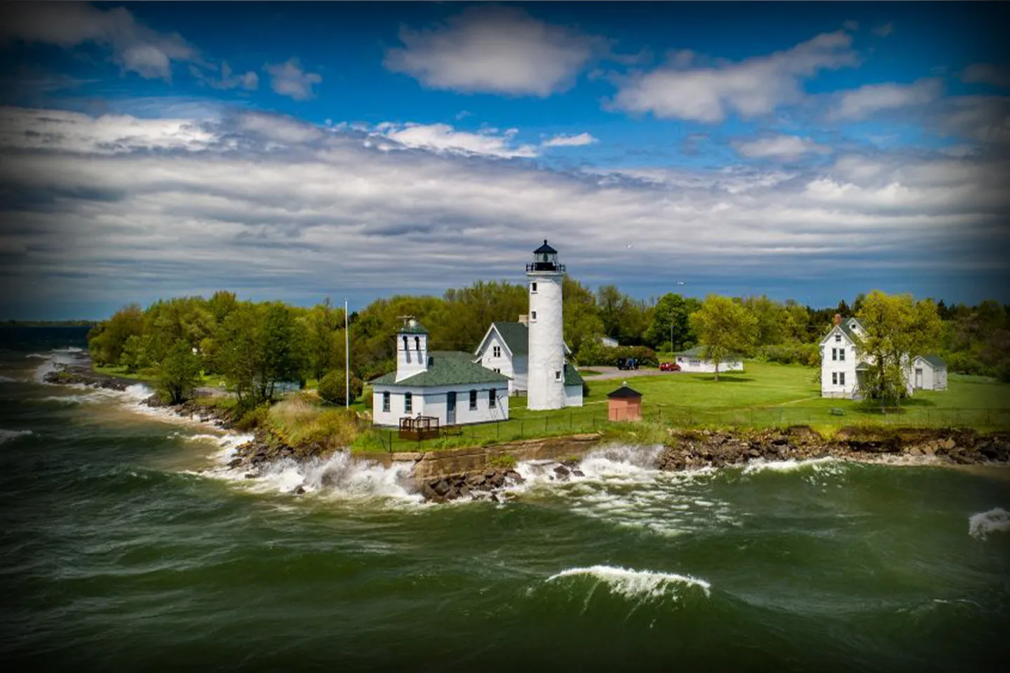 Ontario, NY Chauffeur Service black SUV at airport terminal for reliable transfer service