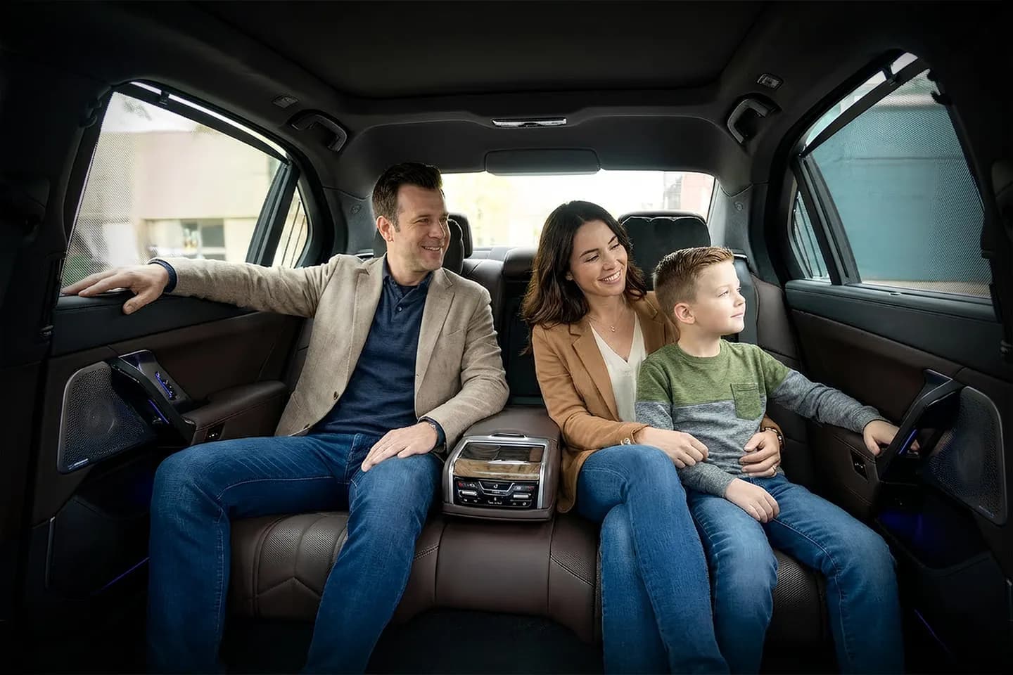 Professional chauffeur opening car door in Rensselaer NY Chauffeur Service luxury vehicle