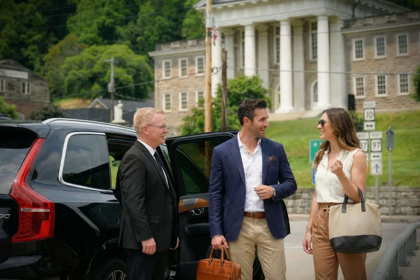 Chauffeur Service in Wyoming, NY Wyoming, NY chauffeur service luxury sedan parked for client pickup in downtown area